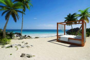 LETTO A BALDACCHINO SULLA SPIAGGIA